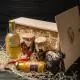 Gift set "Ukrainian delicacies L": liqueur, smoked meats, preserves in a wooden box