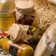 Gift set "Ukrainian delicacies L": liqueur, smoked meats, preserves in a wooden box