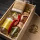 Gift set "Ukrainian delicacies L": liqueur, smoked meats, preserves in a wooden box